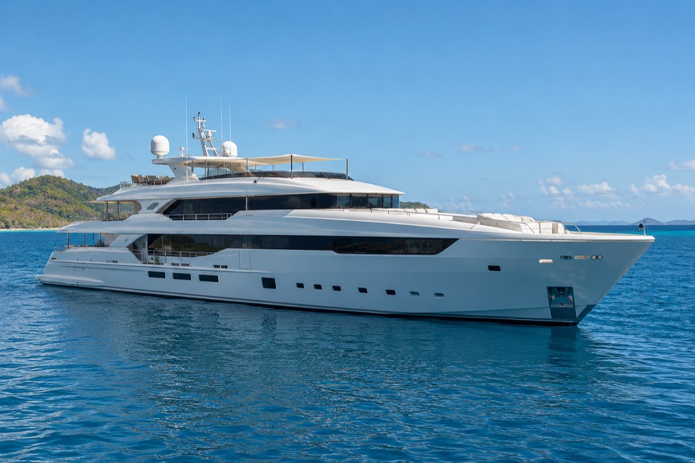Large private motor yacht on open water